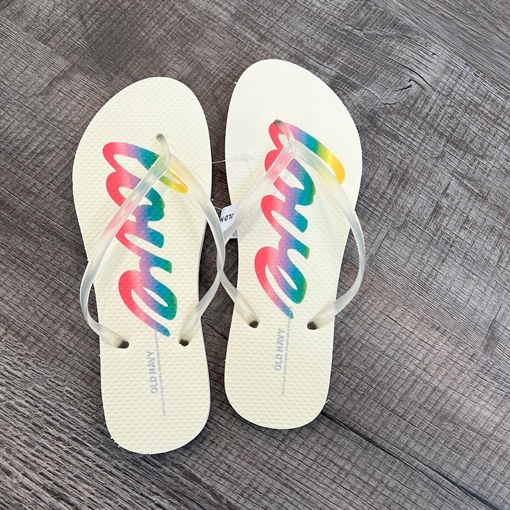 NWT sold Navy flip flops. Size 9